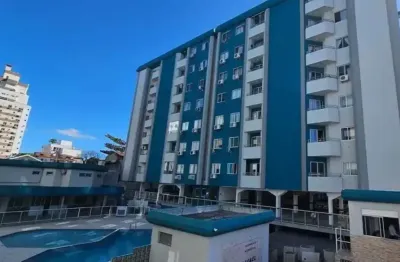 Otimo apartamemnmto em barreiros com 2 dormitórios com sacada e vaga de garagem