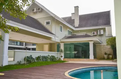 Casa 4 suítes 11 vagas Condomínio Fechado | Santa Felicidade