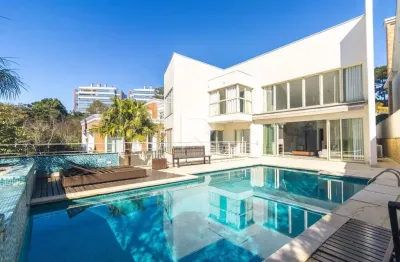 Casa em condomínio com jardim e piscina para locação, 420 m² – mossunguê – curitiba/pr