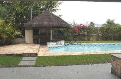 Casa com 4 quartos para alugar na Alameda Nhambiquaras, Alphaville, Santana de Parnaíba