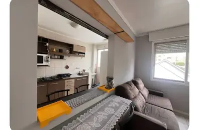 Apartamento 2 dormitorios mobiliado, perto de tudo bem amplo