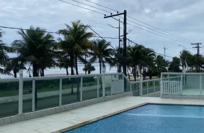 Prédio frente mar com sacada gourmet e churrasqueira carvão.