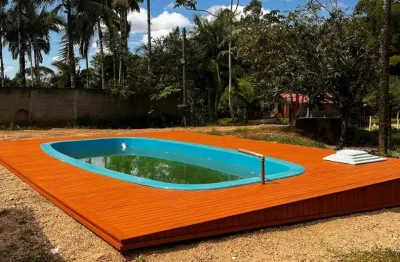 Terreno dos sonhos em tijucas — 2.400m² com lagoa, piscina e muito sossego!
