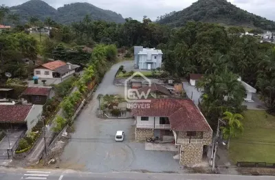 Terreno com sala comercial e kitnetes em massaranduba, sc