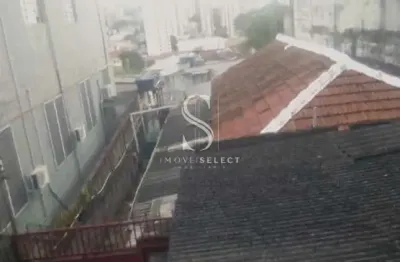 Lapa, terreno residencial de 535m² com casas antigas.