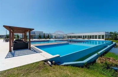 Terreno á venda no condomínio reservas do lago, com 360m²  em nova santa rita rs