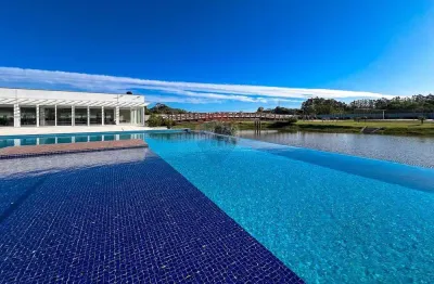 Terreno á venda no condomínio reservas do lago, com 382m² em nova santa rita rs