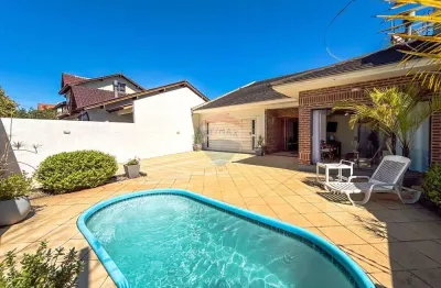 Casa térrea com piscina  3 dormitórios àvenda bairro bela vista canoas rs