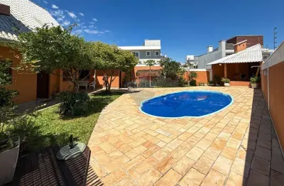 Excelente residência com 6 dormitórios, hidromassagem, piscina e ampla área de lazer à venda no moinhos de vento – canoas