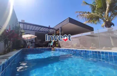 Casa moderna, dentro de condomínio, 4 quartos, lazer completo, lote de 400m² no conjunto 05 em arniqueiras.
