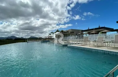 Terreno em condomínio fechado à venda na avenida norte sul nova guarapari, 630, nova guarapari, guarapari por r$ 1.300.000