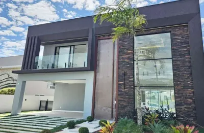 Casa luxo no alphaville litoral norte i: 4 suítes, 3 salas, 4 vagas, 275 m². lindíssima!