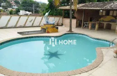 Ótima casa no badu, composta por 5 quartos e 4 suítes, lazer completo!