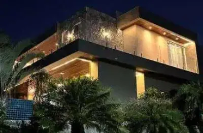 Maravilhosa casa com 5 suítes no condomínio alphaville 2 paralela