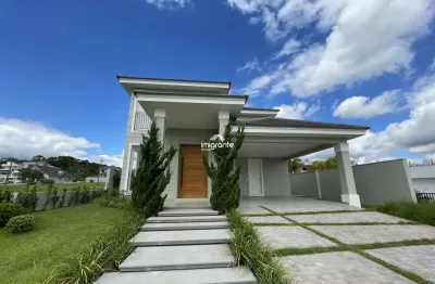 Casa parcialmente mobiliada no condomínio serra azul