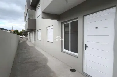 Apartamento térreo com pátio privativo - em construção