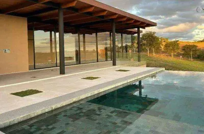 Residência de luxo na faixa 01 do boa vista village — vista para o campo de golfe e design assinado