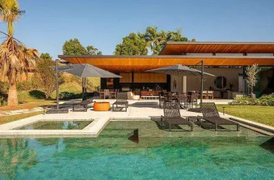 Casa de alto padrão para venda na quinta da baroneza – 5 suítes, piscina aquecida e quadra de beach tênis