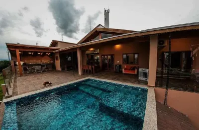 Casa com 4 dormitórios à venda, 490 m² por r$ 2.000.000,00 - village mantiqueira - guaratinguetá/sp