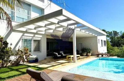 Casa em condomínio fechado com 5 quartos para alugar na avenida araçá, 280, loteamento alphaville campinas, campinas, 600 m2 por r$ 24.000