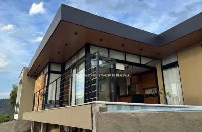 Espetecular casa de condominio à venda em nogueira com 3 suítes, piscina