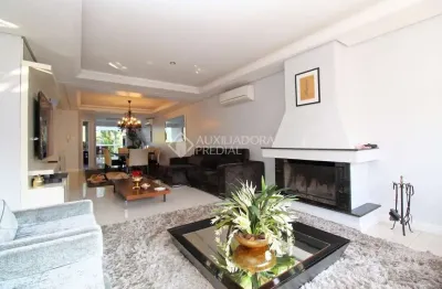 Casa com 3 quartos à venda na rua comendador creidy, 330, chácara das pedras, porto alegre, 362 m2 por r$ 2.450.000