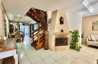 Casa em condomínio fechado com 3 quartos à venda na rua professor isidoro la porta, 58, jardim itu sabará, porto alegre, 253 m2 por r$ 1.190.000