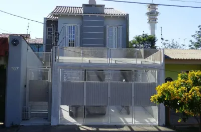 Casa em condomínio fechado com 3 quartos à venda na rua banco inglês, 307, santa tereza, porto alegre, 244 m2 por r$ 620.000
