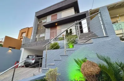 Casa com 3 quartos à venda na rua verdes campos, 110, mário quintana, porto alegre, 289 m2 por r$ 1.400.000