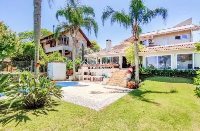 Casa em condomínio fechado com 3 quartos à venda na avenida firmino octávio bimbi, 255, cavalhada, porto alegre, 450 m2 por r$ 3.500.000