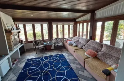 Casa em condomínio fechado com 3 quartos à venda na rua erechim, 100, nonoai, porto alegre, 202 m2 por r$ 870.000