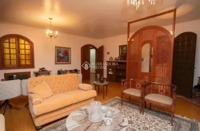 Casa com 4 quartos à venda na rua eudoro berlink, 599, auxiliadora, porto alegre, 280 m2 por r$ 2.500.000