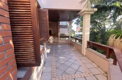 Apartamento com 4 quartos à venda na Avenida da Cavalhada, 5793, Cavalhada, Porto Alegre, 134 m2 por R$ 699.000