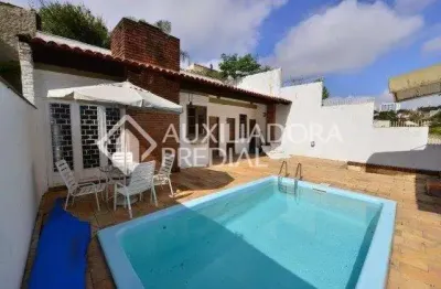 Casa em condomínio fechado com 4 quartos à venda na rua doutor jorge fayet, 501, chácara das pedras, porto alegre, 223 m2 por r$ 1.600.000