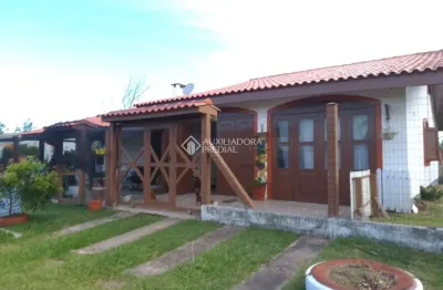 Casa com 4 quartos à venda na Navegantes, 63, Centro, Balneário Pinhal, 150 m2 por R$ 299.000