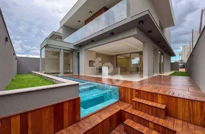 Sobrado com 4 dormitórios à venda, 344 m² por r$ 4.000.000,00 - condomínio terras altas - uberlândia/mg