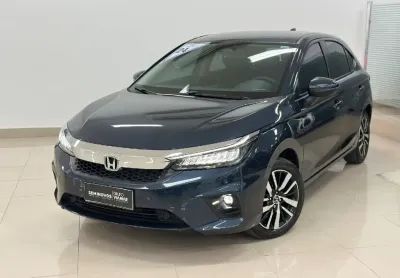 O honda city hatch 2023 touring, com motor 1.5 i-vtec flex, entrega 126 cv e 15,8 kgfm de torque, o 