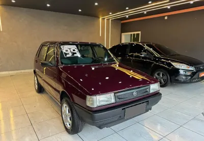 Uno mille ex 1999 vermelho