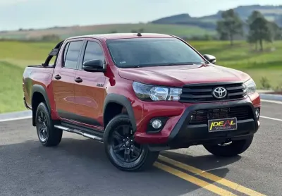 Toyota hilux cd sr chall. 4x4 2.8 tdi dies aut.  - vermelha - 2017/2018