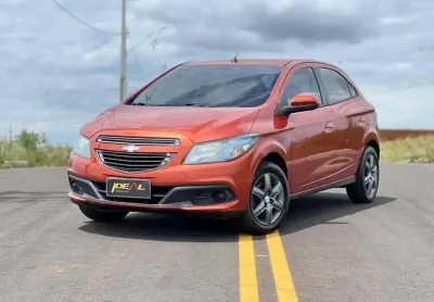 Chevrolet onix 1.4 lt - laranja - 2013/2013