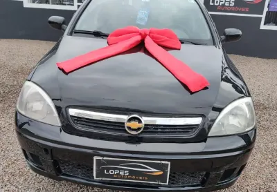 Corsa hatch com direção hidráulica, vidros elétricos