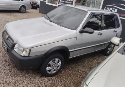 Uno mille 4 portas - 1.0- com direção hidráulica, ar cond., vidros elétricos