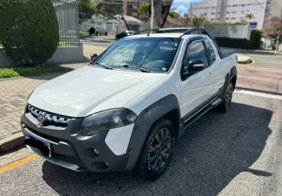 67.900,00 / strada adventure ce flex 1.8 - completo - impecavel