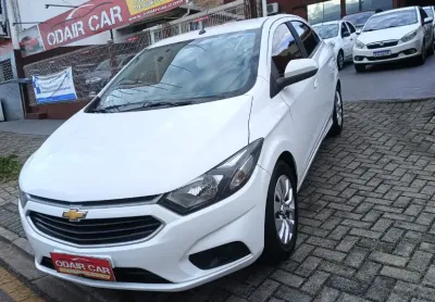 Onix lt 1.4 completo:air bag, alarme, ar condicionado, ar quente, direção hidráulica, travas elétric