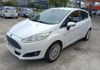 Titanium 1.6 completo super novo em excelente estado com manual e chave cópa.