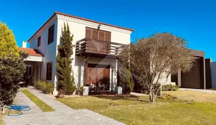 Casa em condomínio fechado com 4 quartos à venda na Avenida Diamante, 1173, Rainha do Mar, Xangri-Lá por R$ 1.590.000