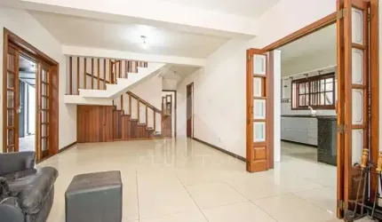 Casa com 5 quartos à venda na Rua Zeev Jabotinski, 58, Jardim Itu Sabará, Porto Alegre por R$ 1.200.000
