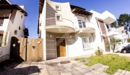 Casa em condomínio fechado com 3 quartos à venda na Avenida Edgar Pires de Castro, 540, Hípica, Porto Alegre por R$ 1.100.000