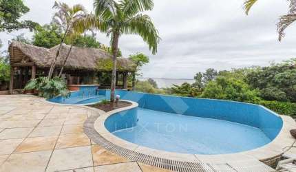 Casa com 5 quartos à venda na Rua Bororó, 301, Vila Assunção, Porto Alegre por R$ 4.800.000