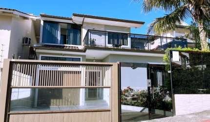 Casa em condomínio fechado com 3 quartos à venda na Rua Padre Osmar Muller, Itaguaçu, Florianópolis por R$ 2.260.000